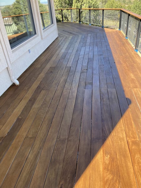 Newly finished hardwood deck with a glossy surface and detailed craftsmanship by Crosby Home Services in Prescott, AZ Newly finished hardwood deck with a glossy surface and detailed craftsmanship by Crosby Home Services in Prescott, AZ