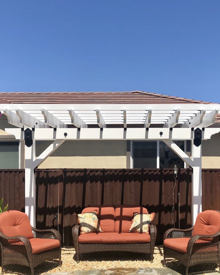 white pergola in prescott valley with seating area