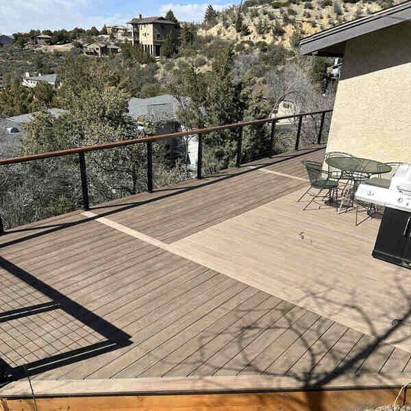 Elevated composite deck with sleek railings and hillside views, built by Crosby Home Services in Prescott, AZ-1